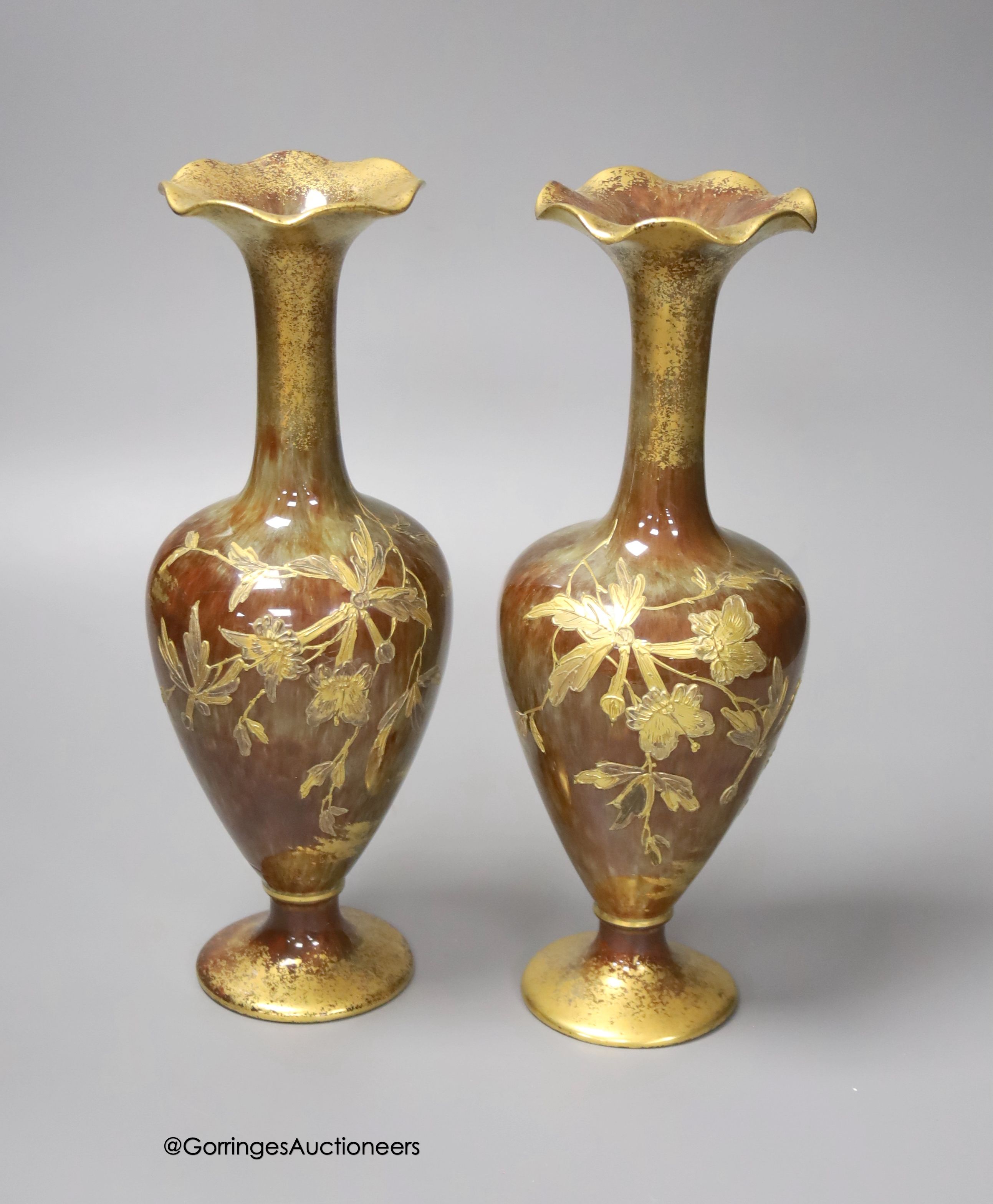 A pair of Forresters Aesthetic period gilded earthenware vases, 27cm